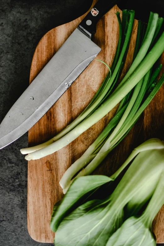 there is a knife that is on a board