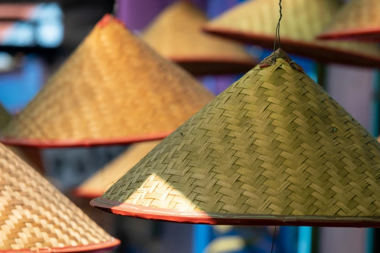 some sort of hanging lantern made of wood and grass