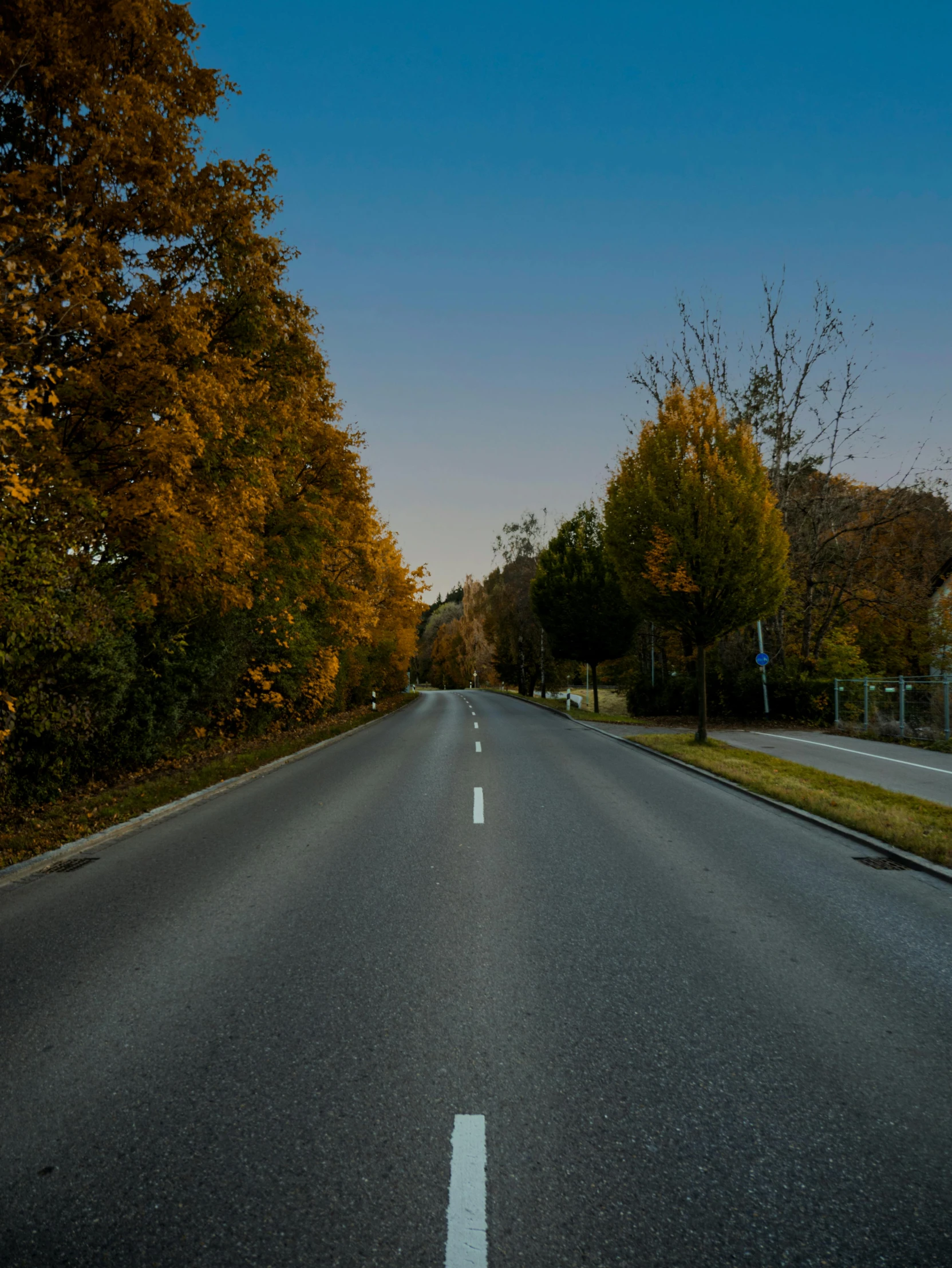 the view down a very long straight road