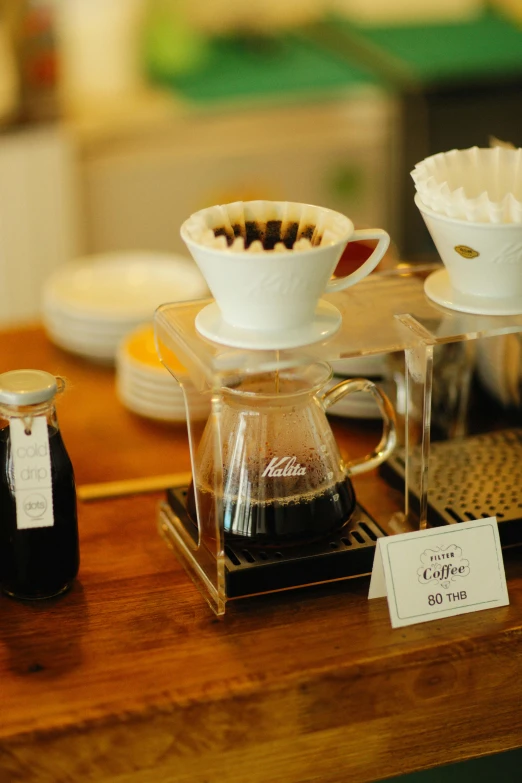 various types of coffee in serving bowls sitting on a table