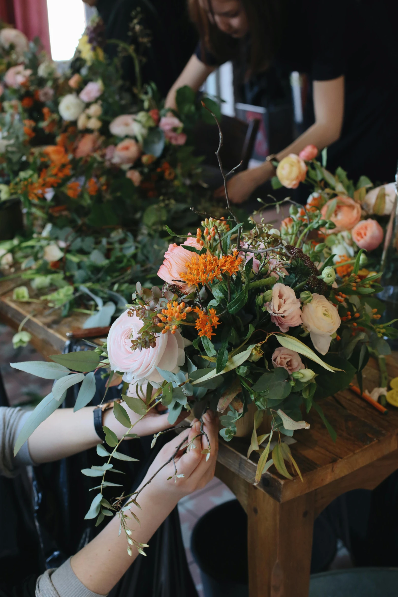 a bunch of flowers that are sitting on a table