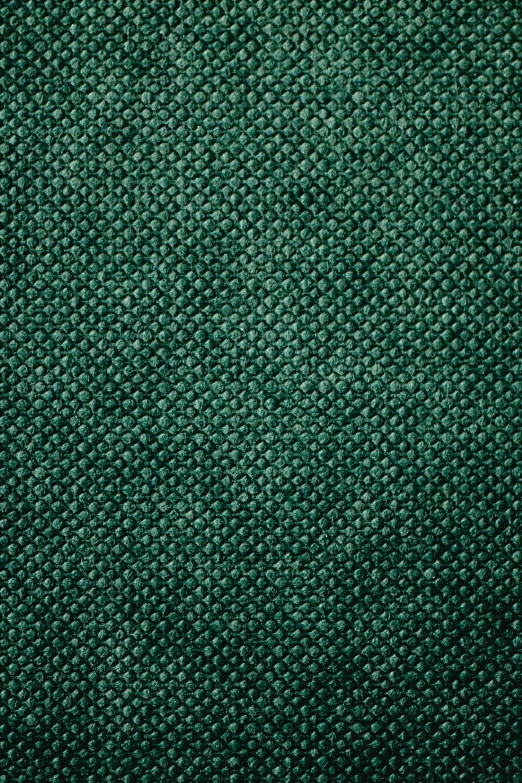 dark green textured fabric with no visible images