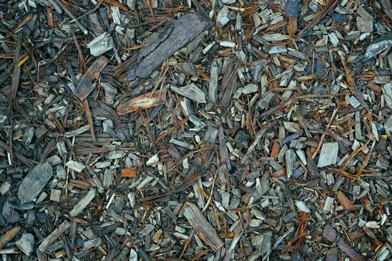 a pile of small gray rocks and dirt