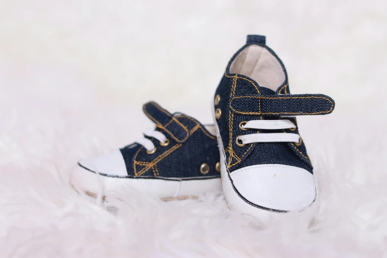 two black and white shoes on a white background