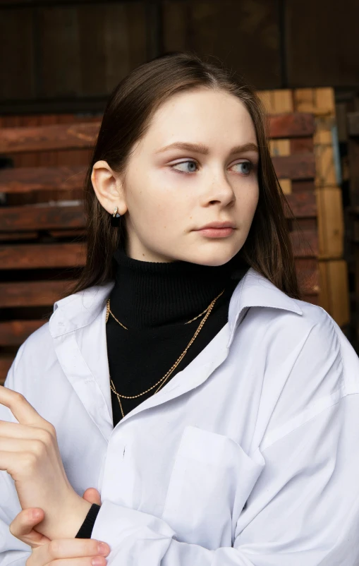 a young woman is posing for a picture