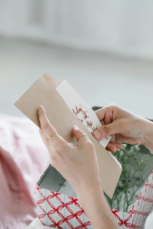 a person holding a book about how to be an english