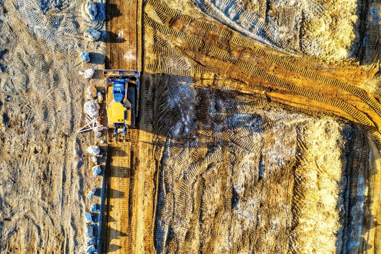 a tractor is parked along the side of a highway