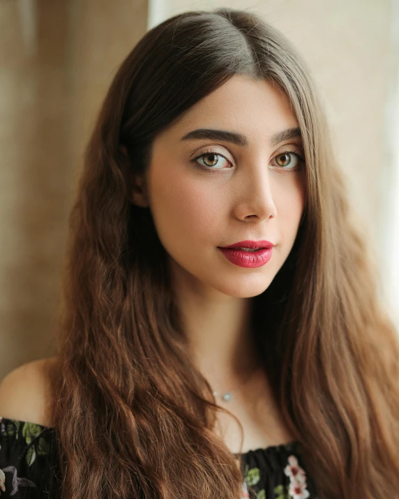 a close - up of a young woman wearing a dress