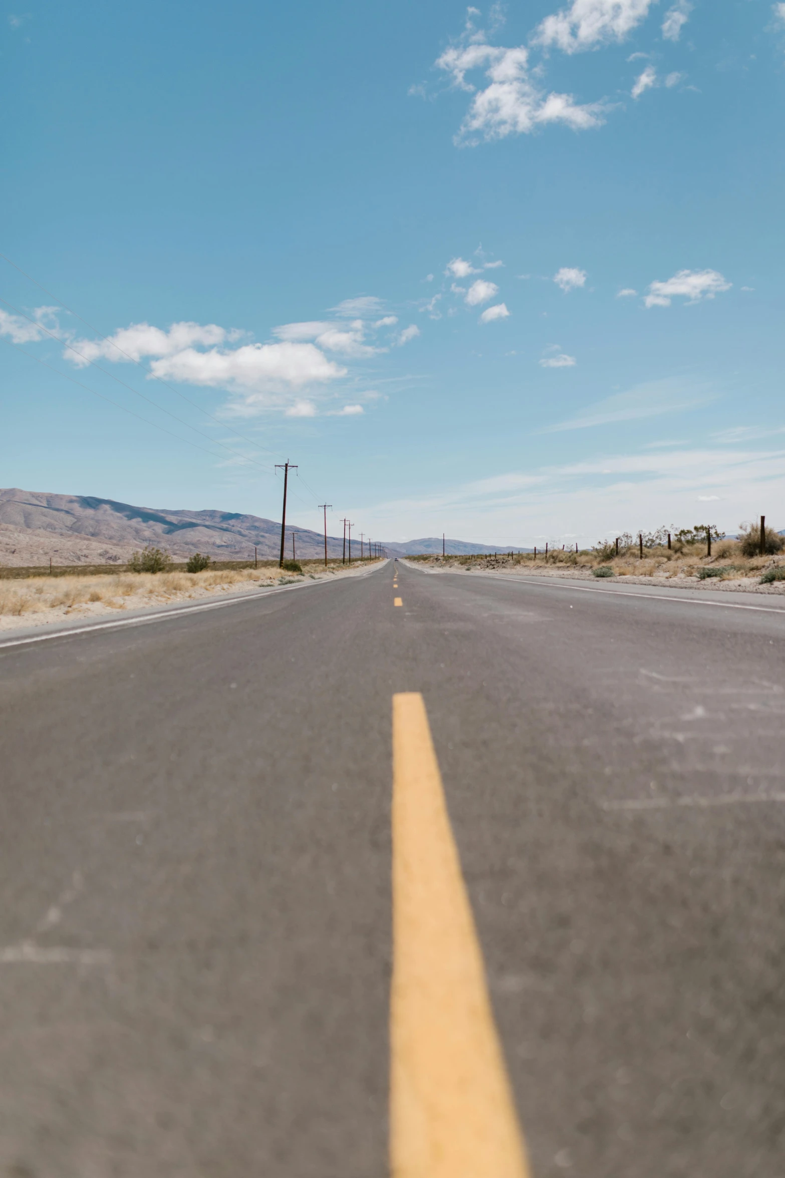 the view of the street from an empty road