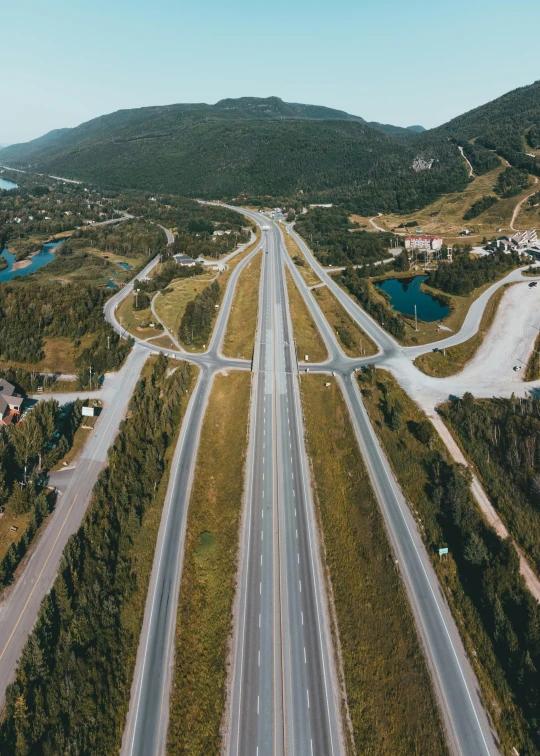 two lanes of traffic are lined up in an open area