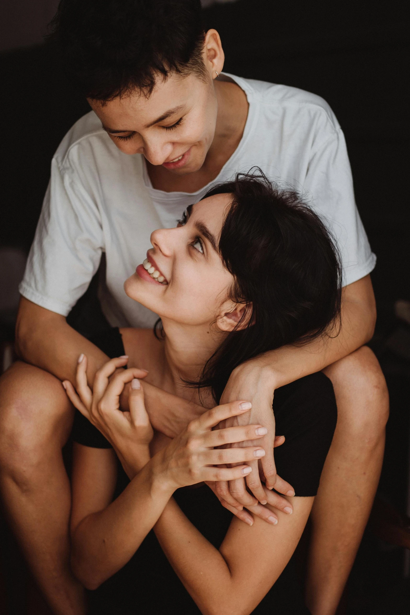 the couple is posing in a po