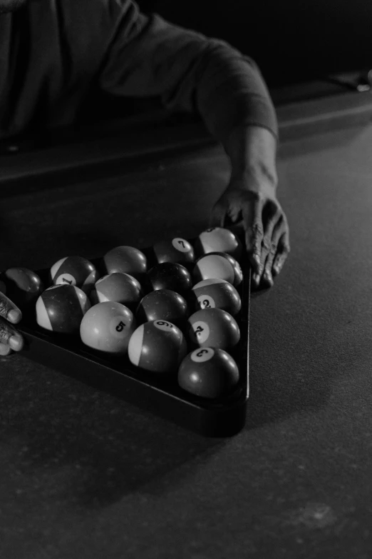 an old fashioned billiard board filled with balls