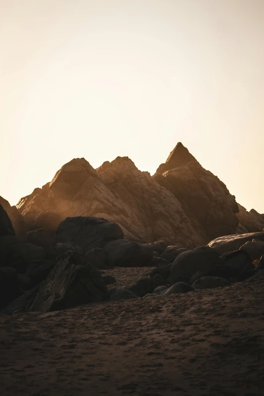 an image of some mountains that are in the middle of the day