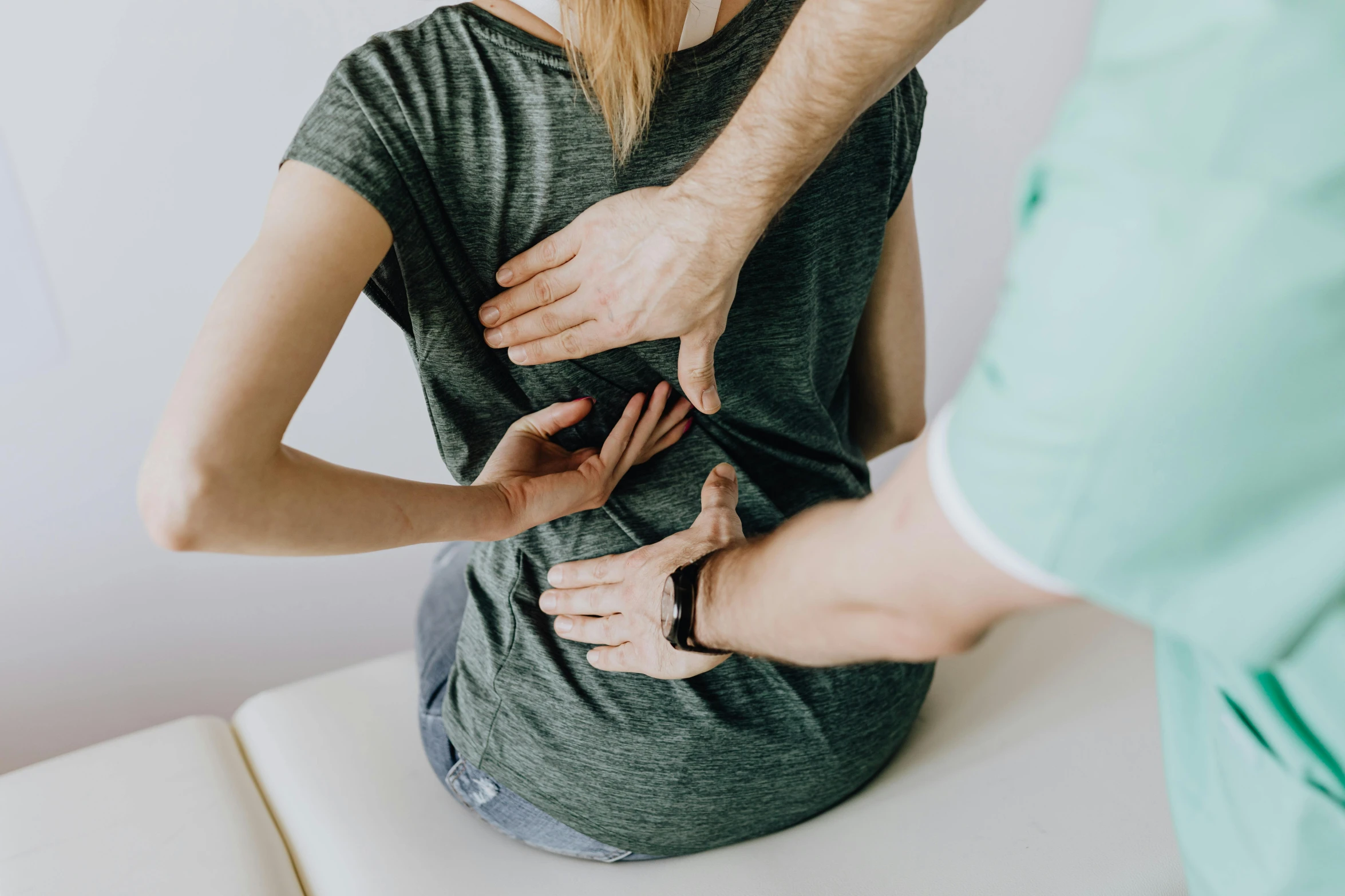 an adult and child doing physical care in a living room