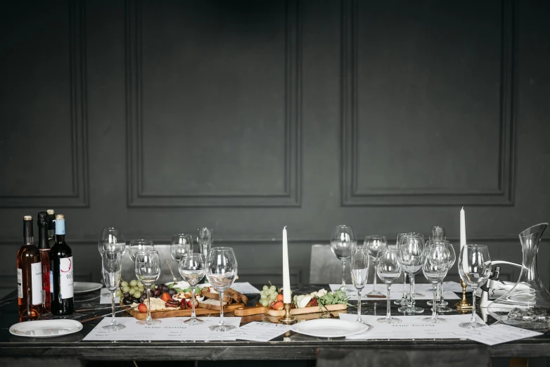 a table with a bunch of wine glasses sitting on it