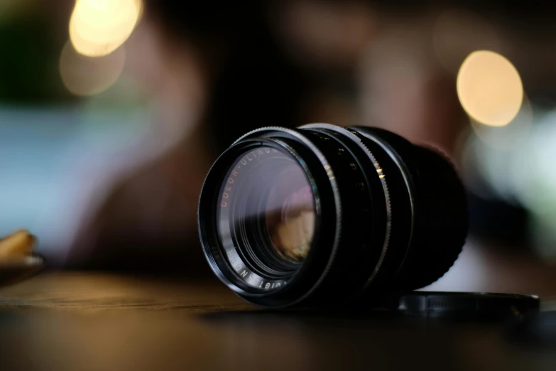 a black camera that is sitting on a table