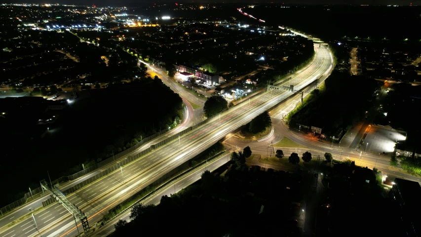 a city skyline at night is seen from the top of an observation tower