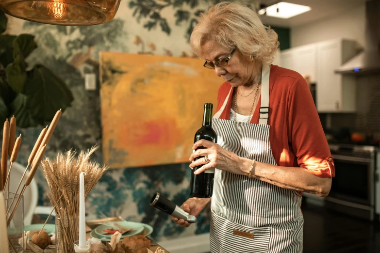 an old lady with an apron holding a wine bottle