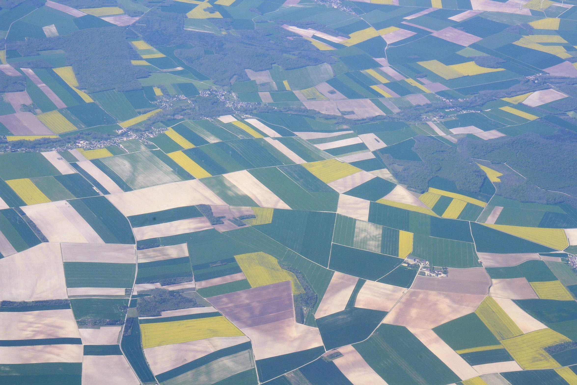 aerial po of several different fields from above