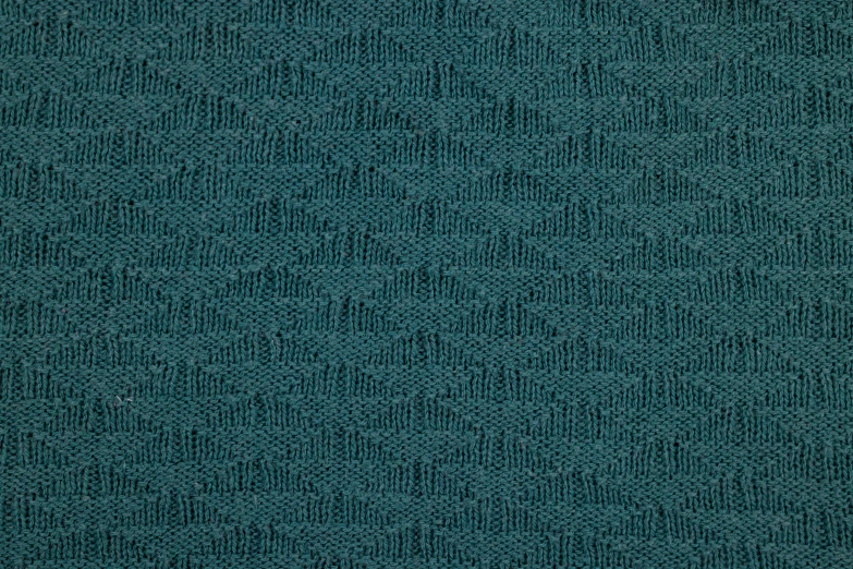 blue textured fabric as background with tiny dots