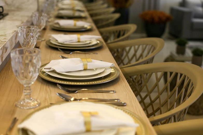 a long table has place settings on it