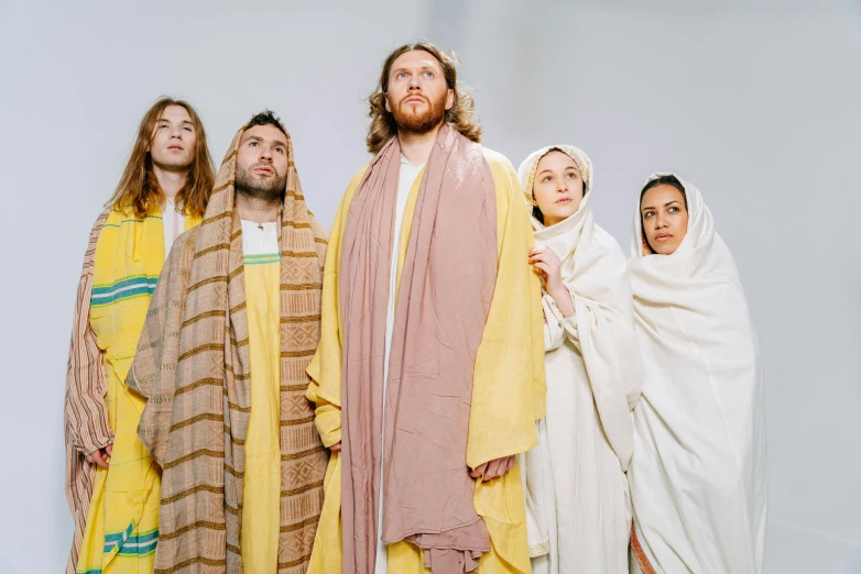 a group of people that are dressed up like jesus