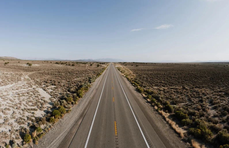 there is a lonely stretch of road that is empty and dry