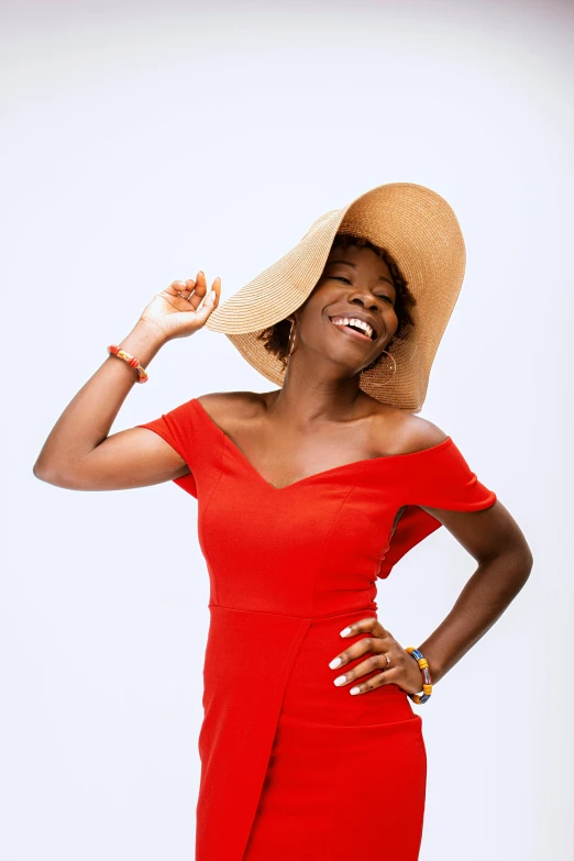 a woman in red dress posing for a picture