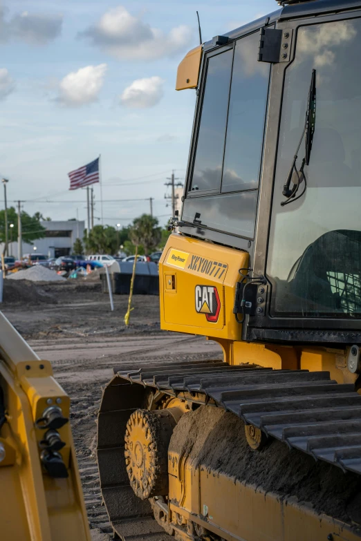 a large bulldozer on display at an open air facility