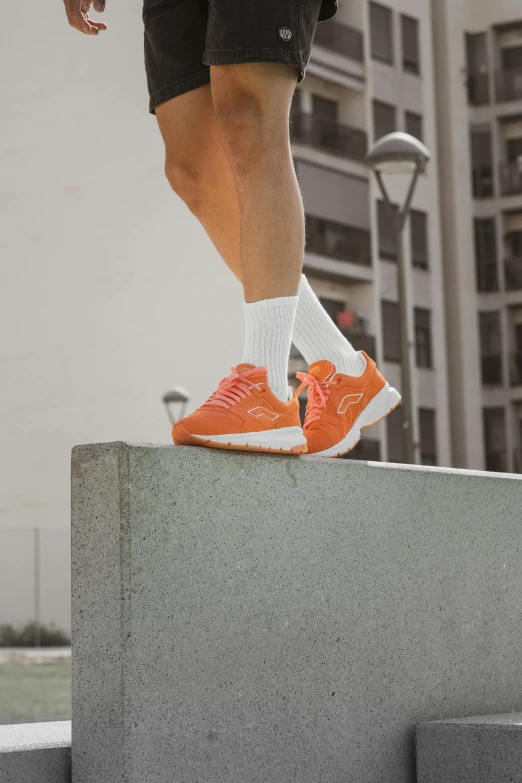 a person's foot is on top of a cement block