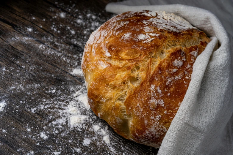 a loaf of bread with some powdered sugar