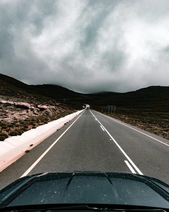 the view from the passenger seat on a highway that is closed