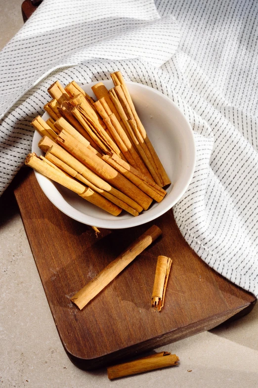 some cinnamon sticks and an over sized bowl