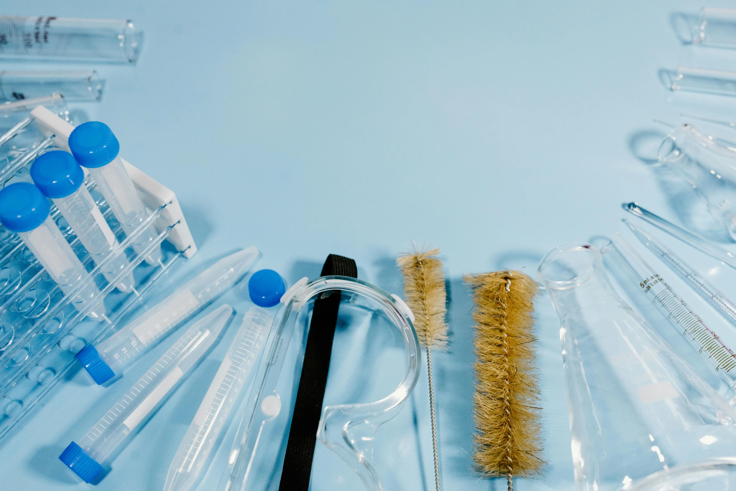 the contents of a baby care system including the brush, combs and tube