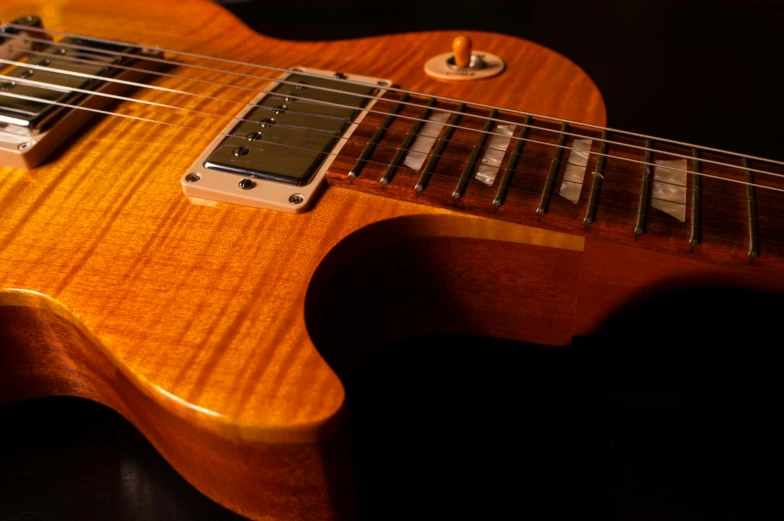 a guitar body and neck of a guitar