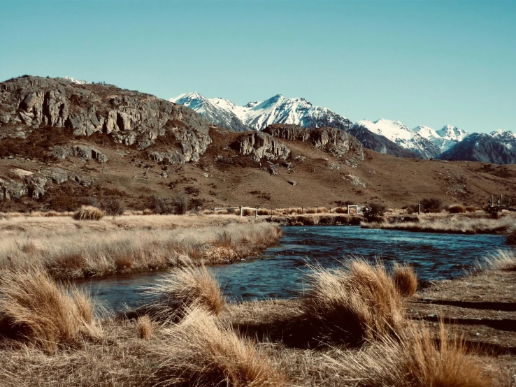 there is a mountain range next to the water