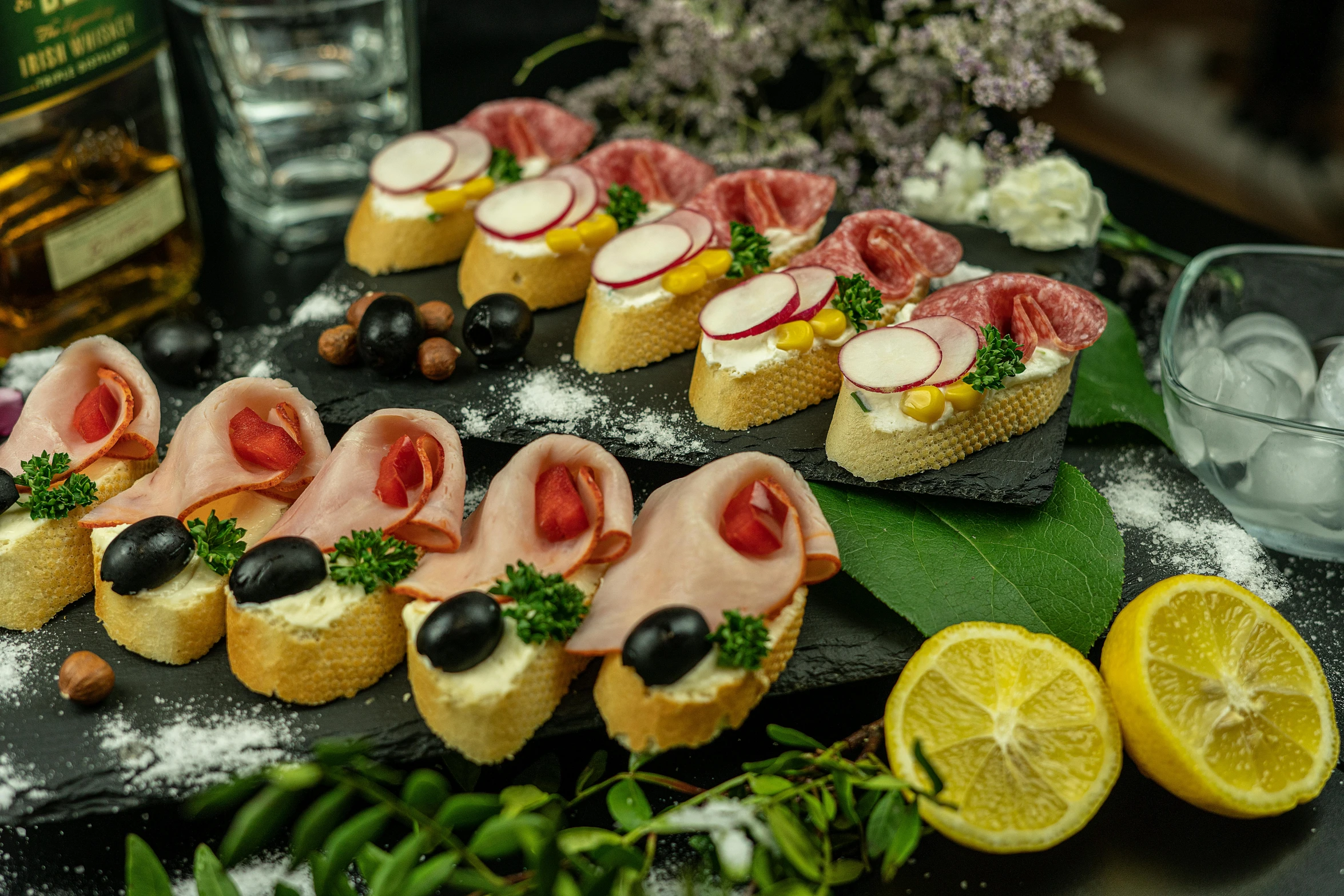 different types of foods being displayed on a table