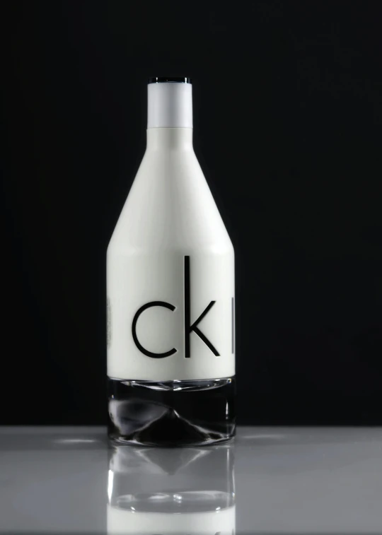 a bottle of alcohol containing the initials c k