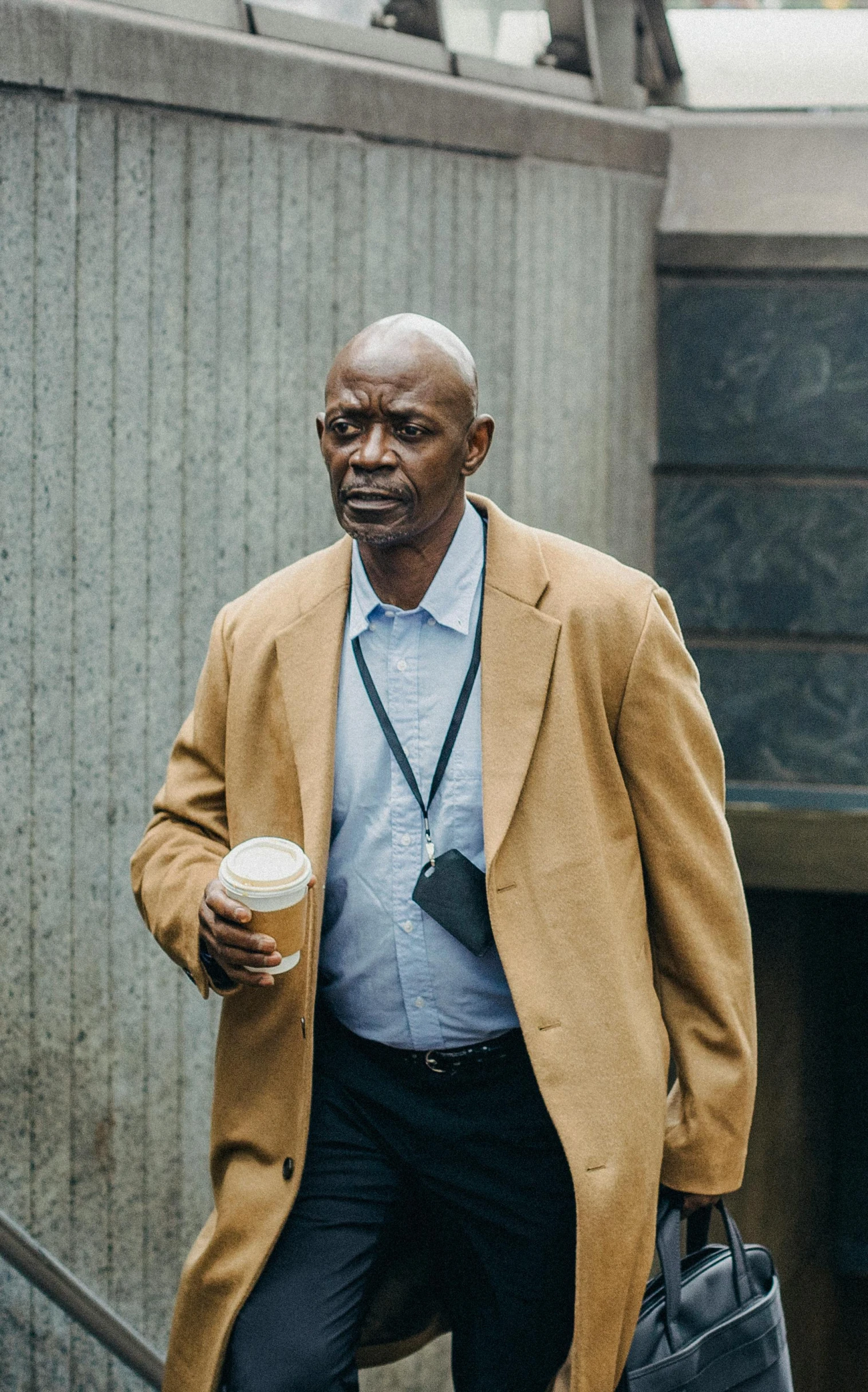 a person carrying a cooler and walking outside