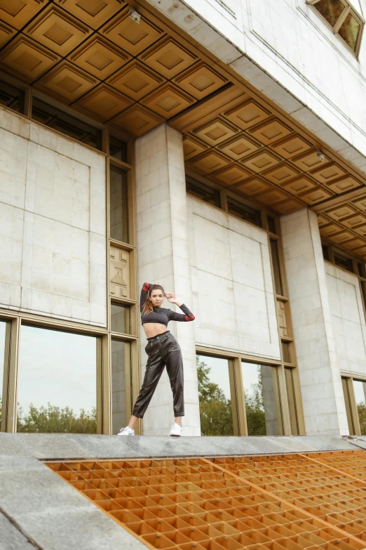 woman in all black taking a break from boxing