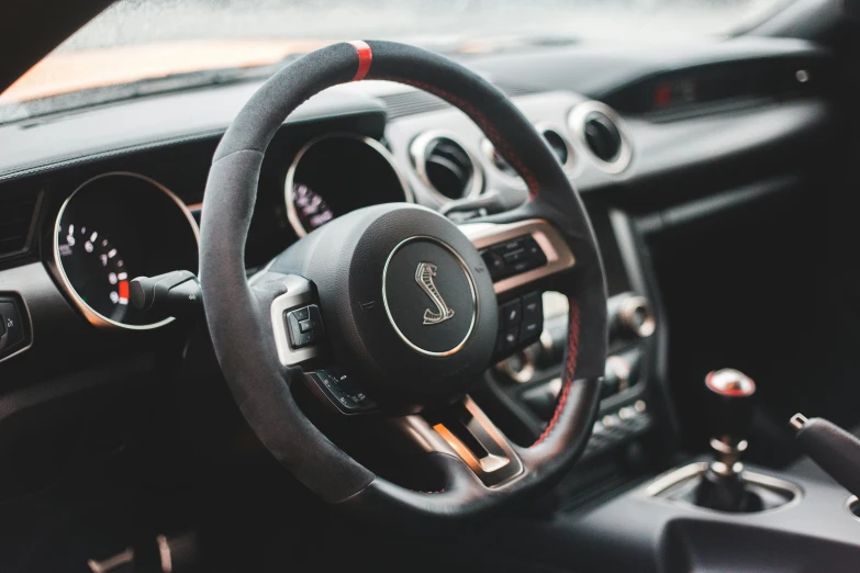 the inside view of a modern car steering wheel