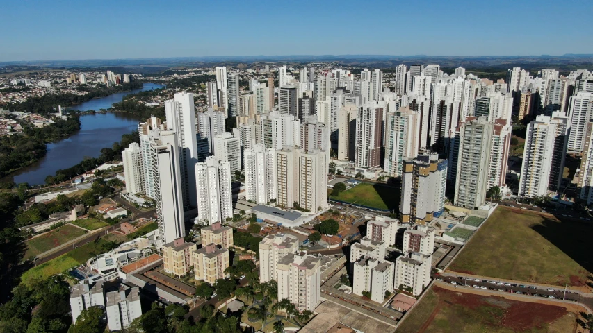 an overhead view of several tall buildings along the river