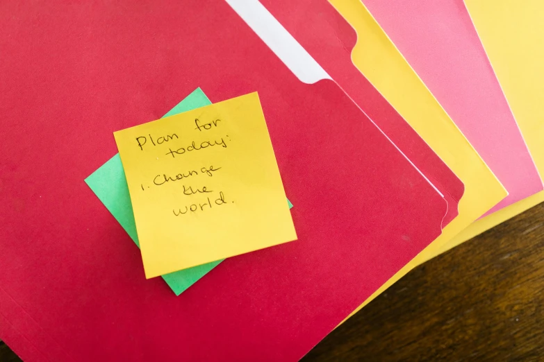 four different red envelopes with notes on them