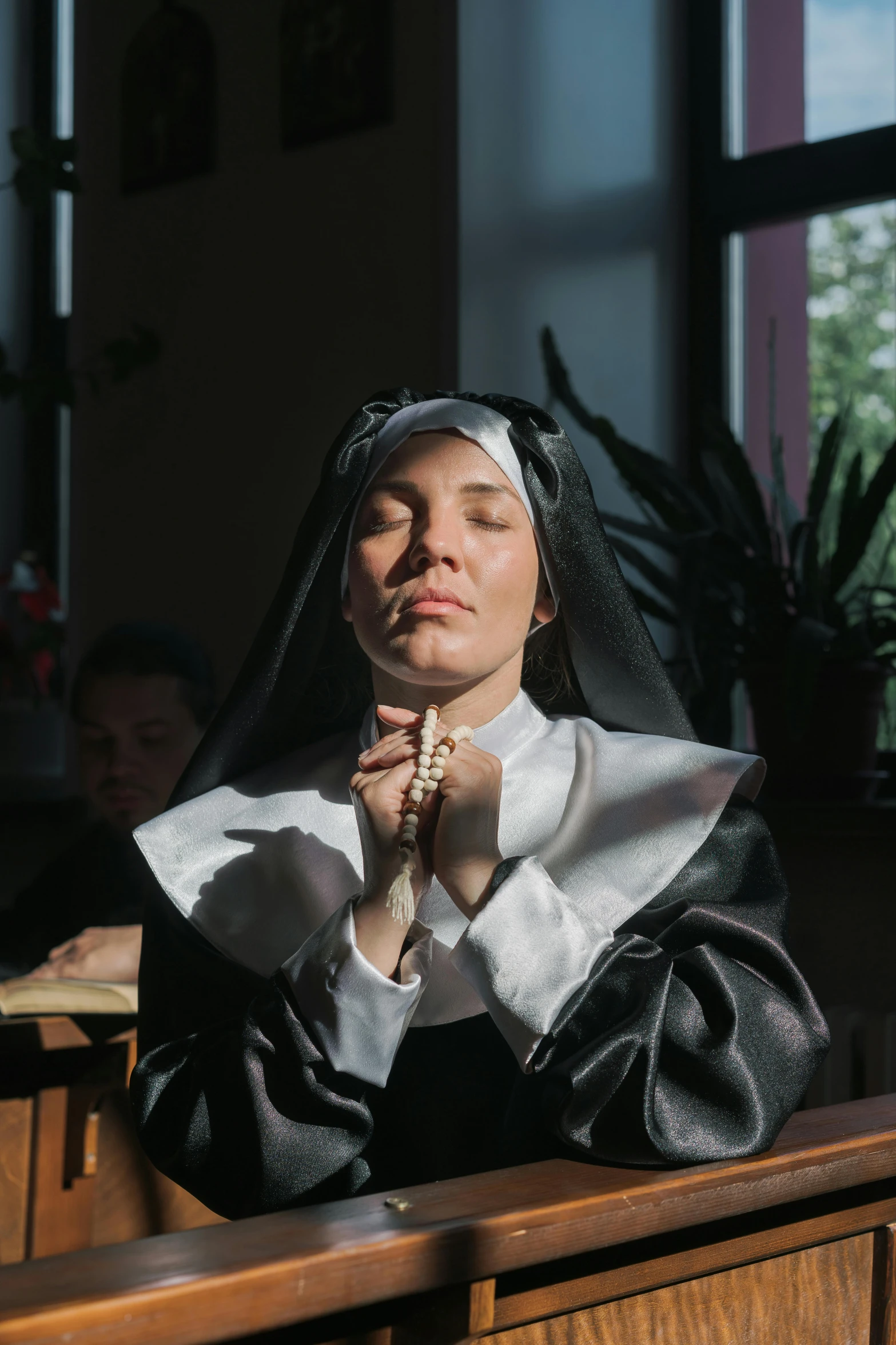 an image of a woman that is wearing nun clothing