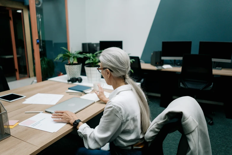 a person in an office working at their desk