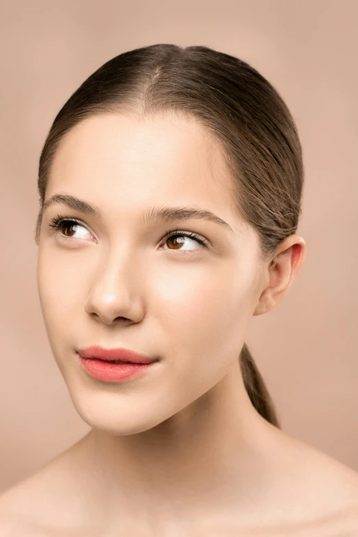 a woman is looking into the camera while posing