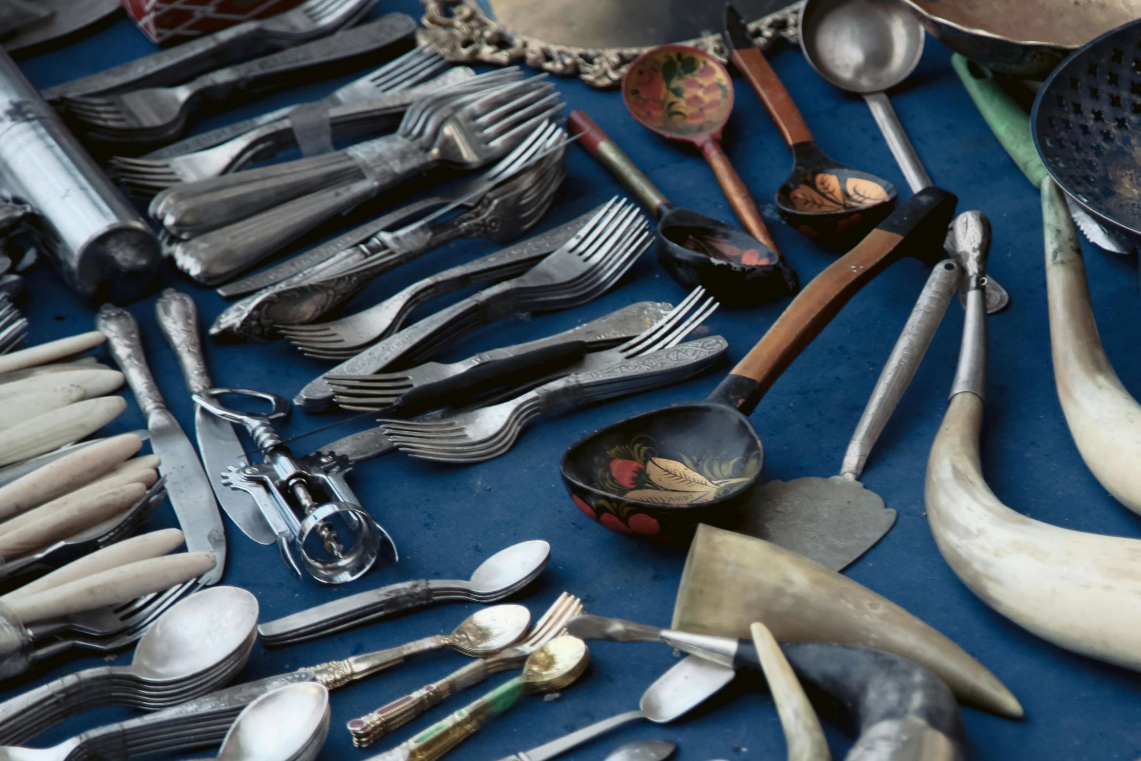 a table with many different utensils on it