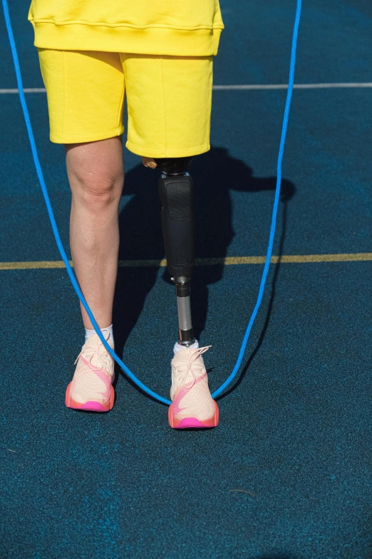 a woman wearing protective gear with a broken leg