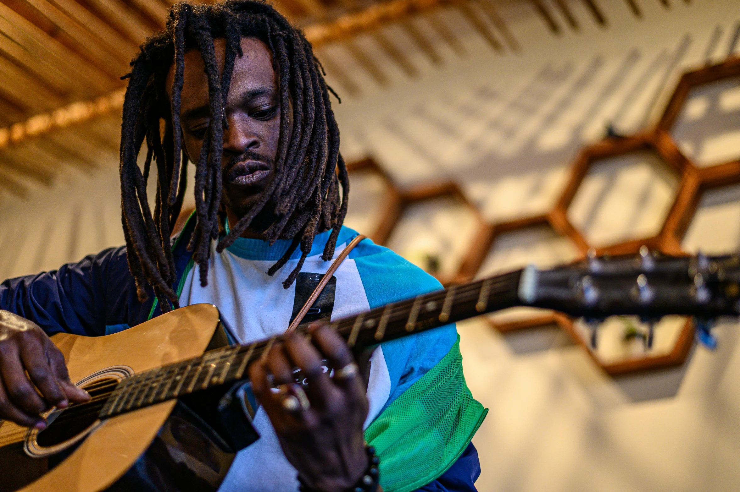 a close up of a person playing an instrument