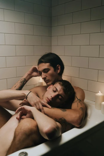a couple of people in a bath tub